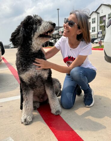 Happy dog enjoying natural gluten free snacks from Makko’s Snack in San Antonio Texas